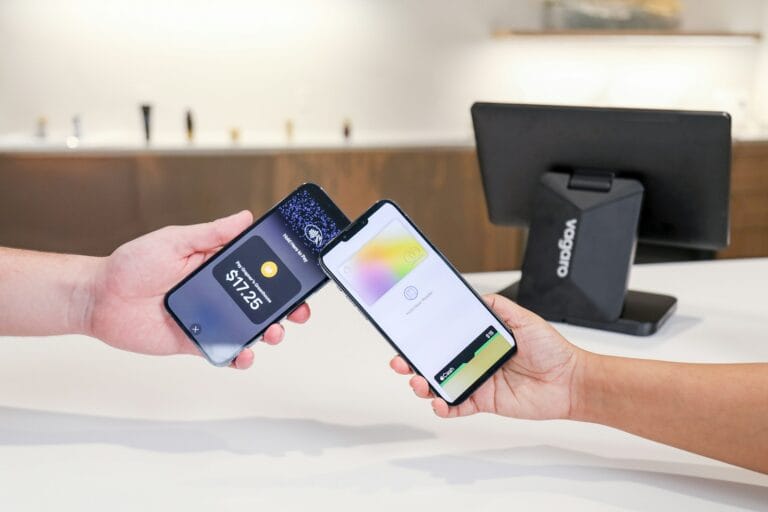 Two phones are used for contactless payment.